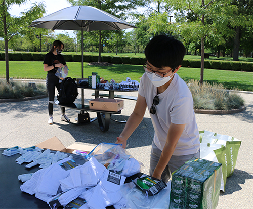 An image of OUWB students packing up hygiene kits