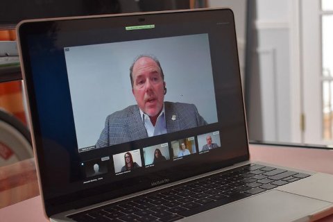 Mark Guthrie, CIO and director, AM General, on a laptop computer screen in a video conference.
