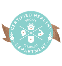A digital badge that says Certified Healthy Department Bronze Recipient with a bronze ribbon and symbols