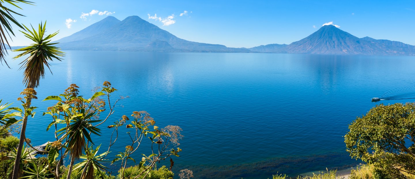 A lake with mountains in the background in Guatemala.