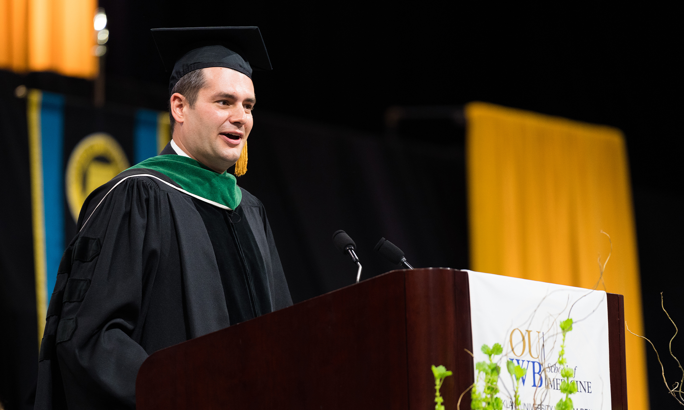 An image of Chris Jaeger, M.D., speaking at OUWB's 2022 commencement