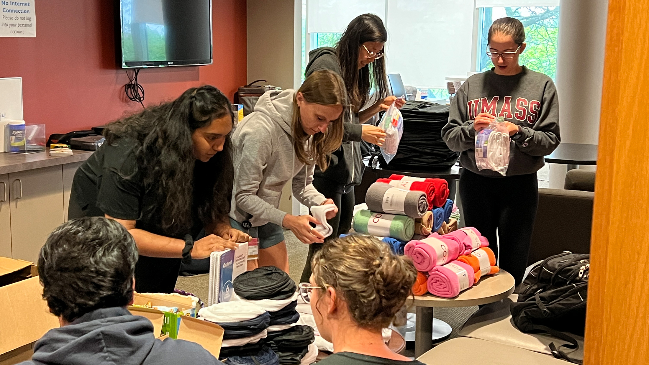 An image of students preparing care packages
