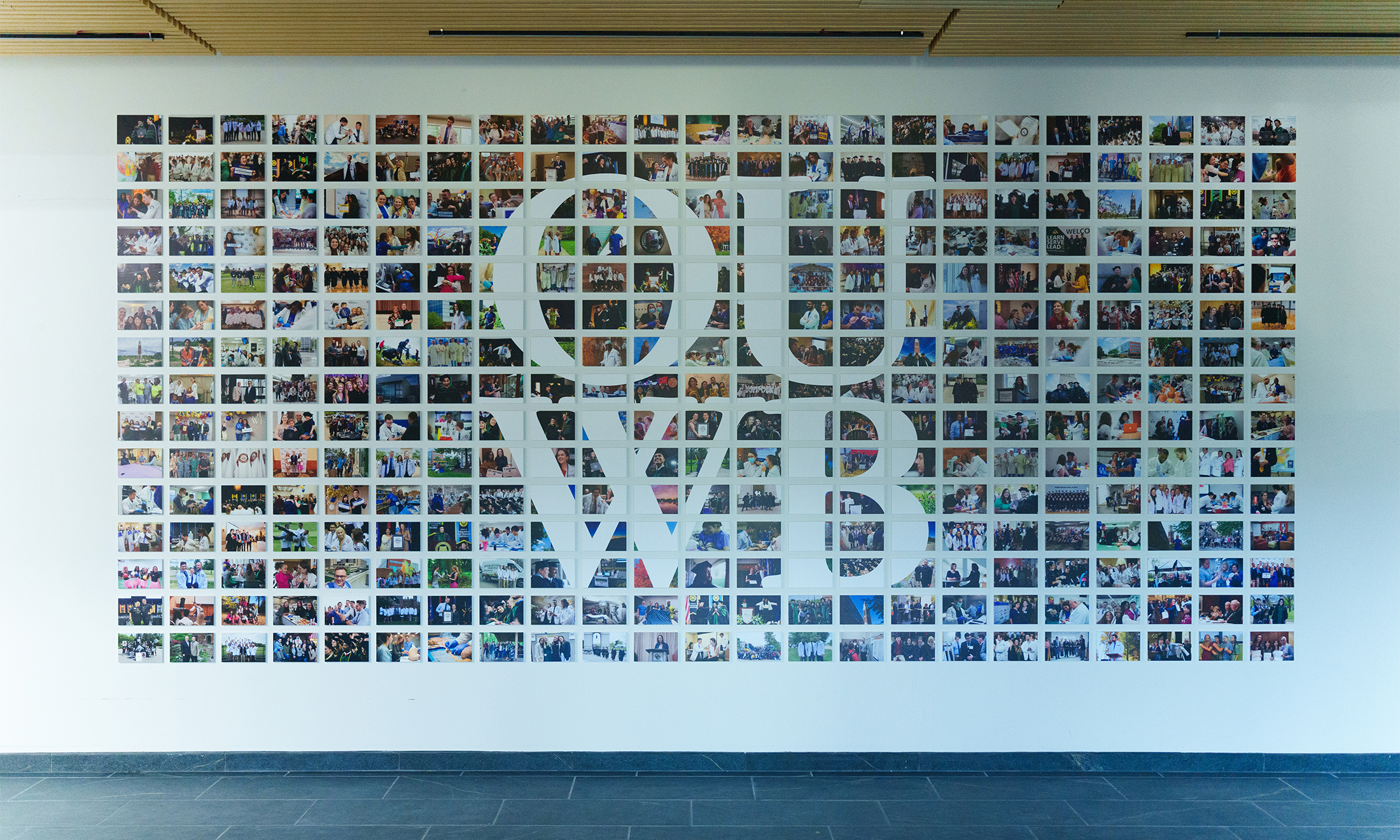 An image of the new photo wall that greets people at the entrance of ODowd