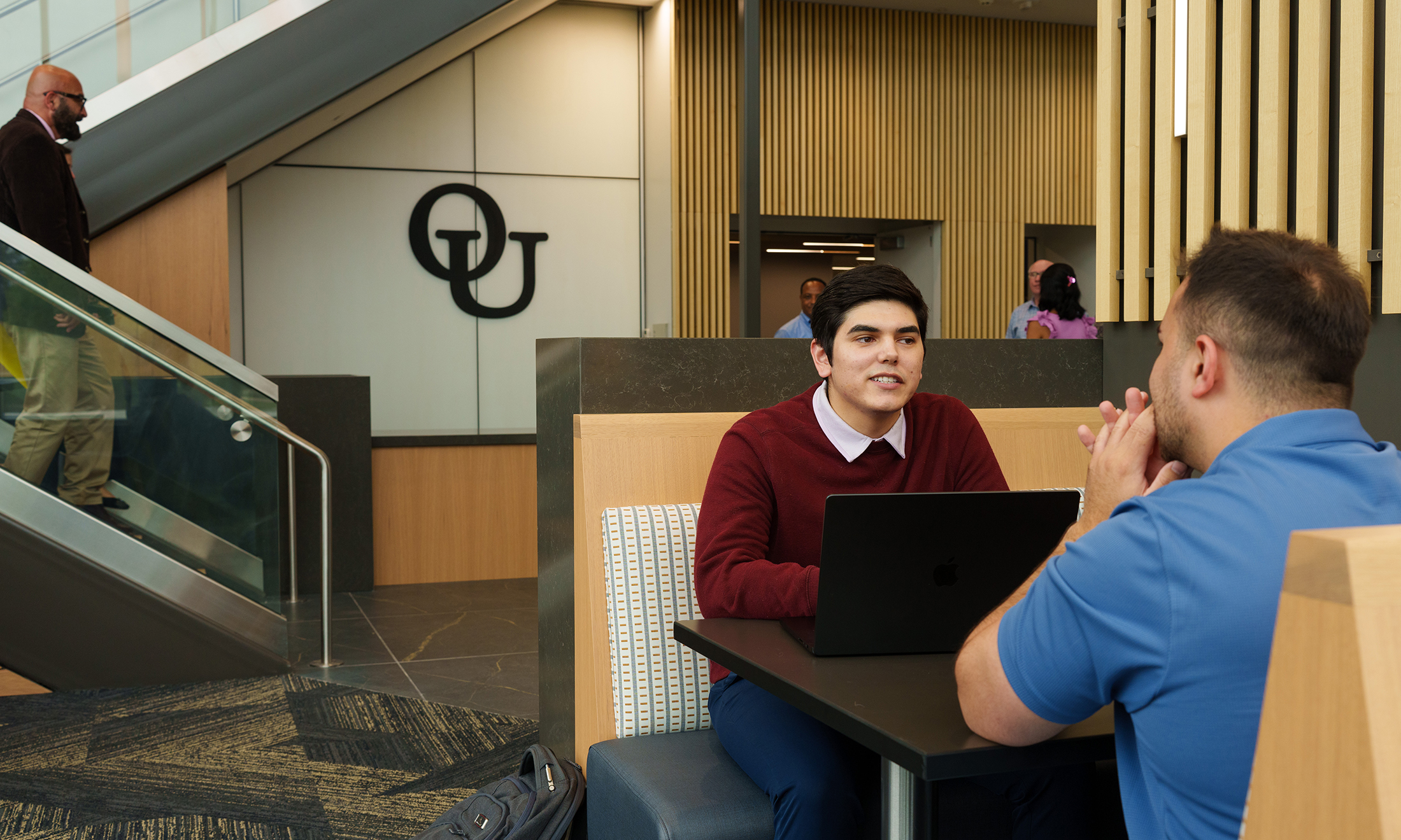 An image of students sitting in one of the new study areas