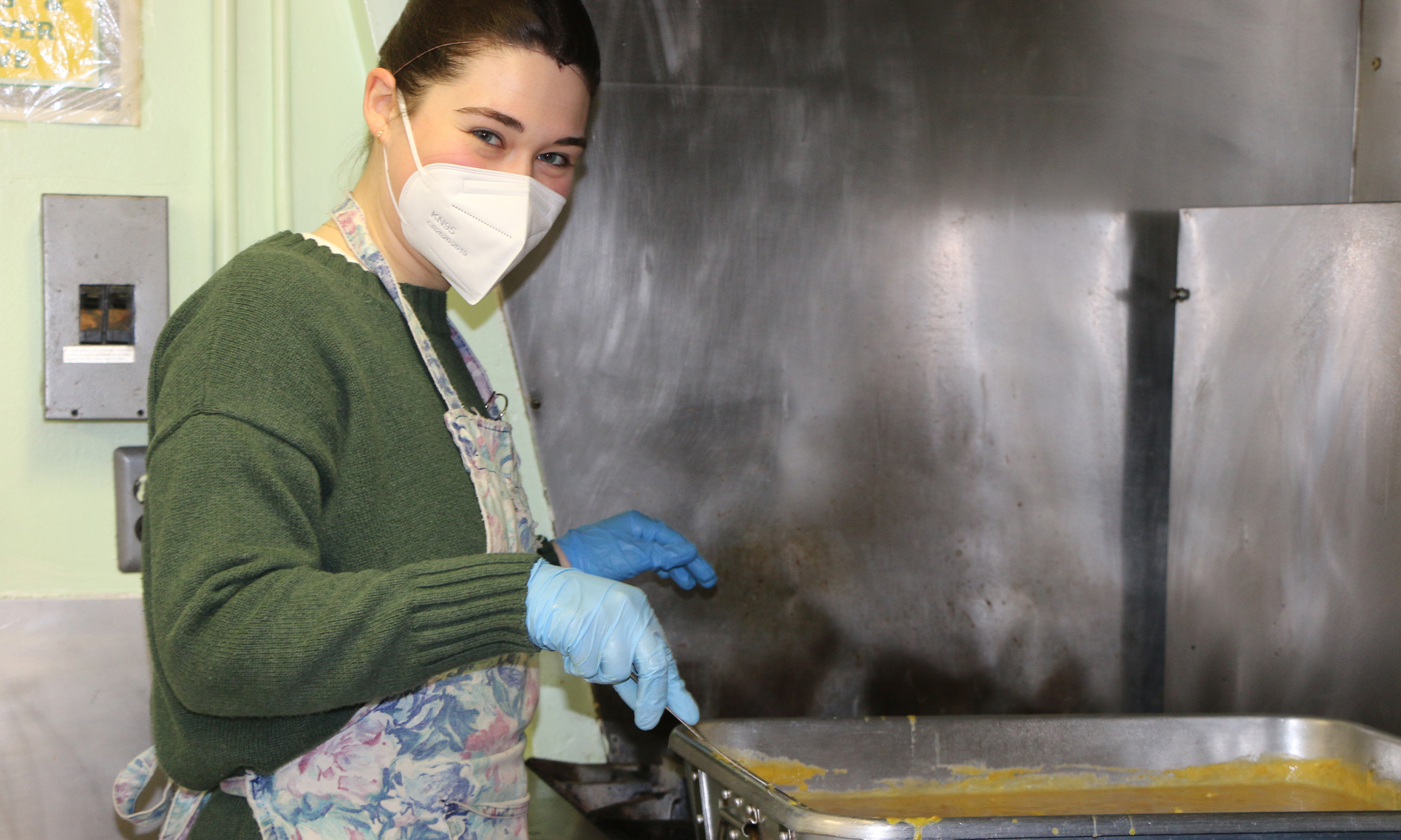 An image of an OUWB student volunteering at Baldwin Center