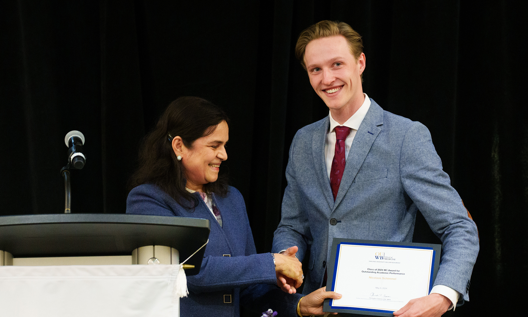 An image of a student receiving an award