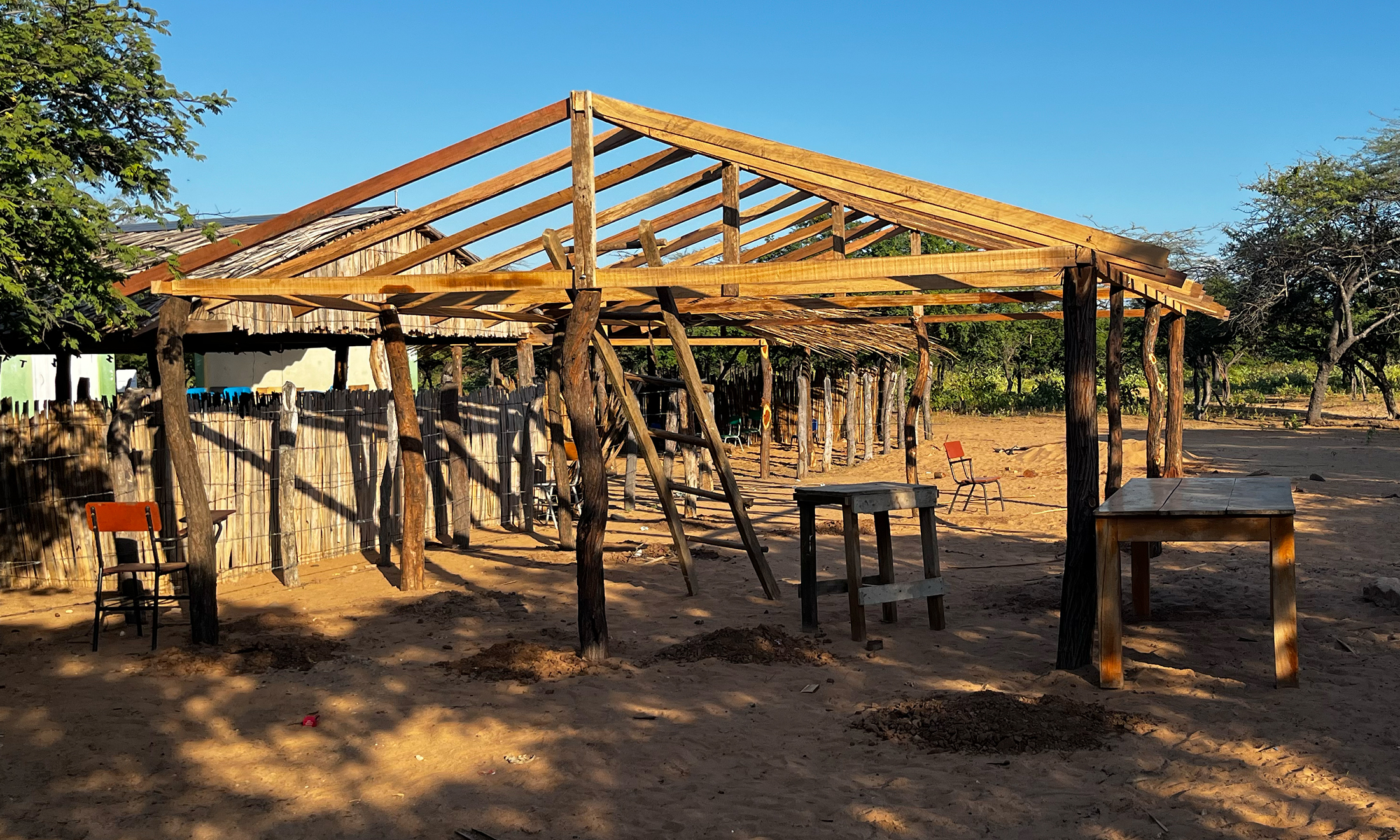 An image of the framing for a new schoolhouse 