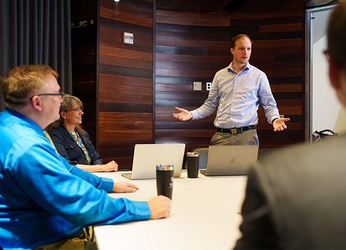 A group of EMBA students studying together