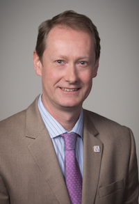 Headshot of Stefan Walter, Ph.D. in a brown jacket