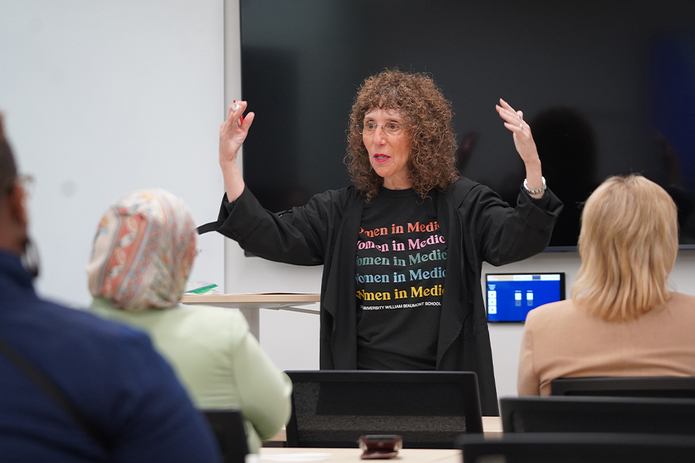 An image of Dr. Pescovitz speaking during a keynote