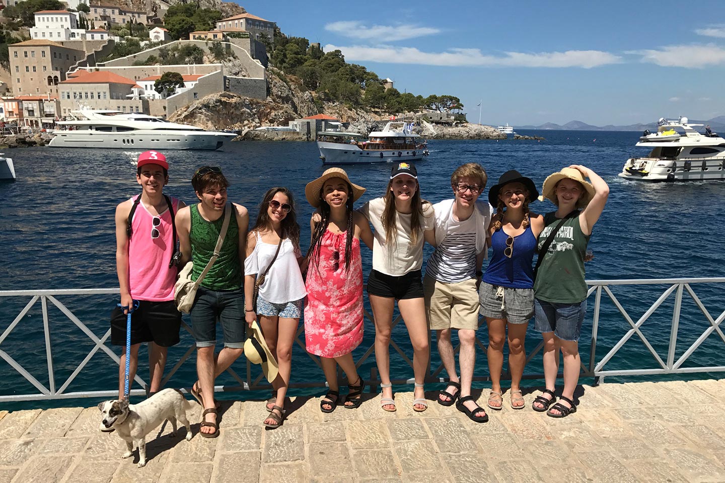 Students Mark Ujkstivani, Joel Hunter, Lily Talevski, Jordan Taylor, Natalie Manor, Noah Fillion, Alaina Whidby, Erin Wiley at Hydra port in Greece