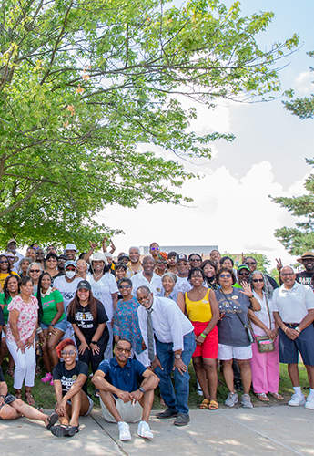 Group of people standing together outside