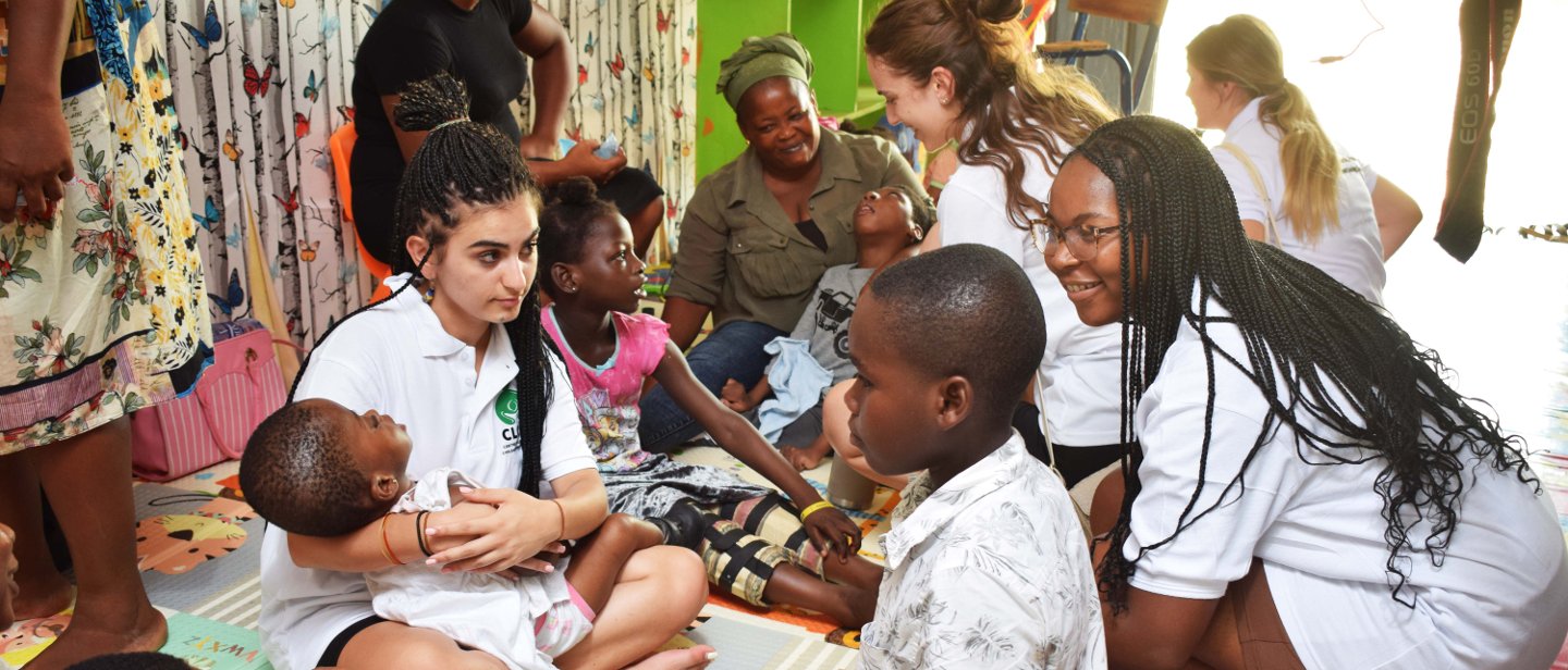 Students and children in a health care clinic.
