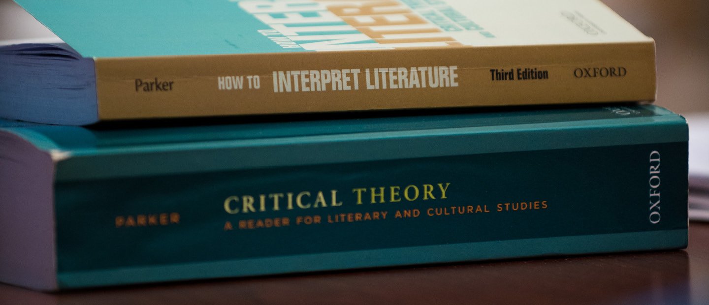 How to Interpret Literature textbook stacked on top of Critical Theory textbook