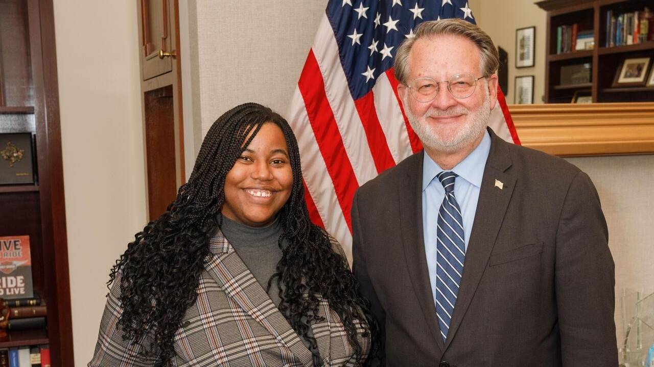 Nia Matthews and U.S. Senator Gary Peters