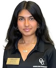 Shivani Patel smiling at the camera