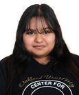 Joannie Texta-Romero smiling at the camera
