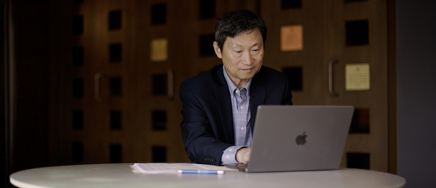 Man sitting at laptop