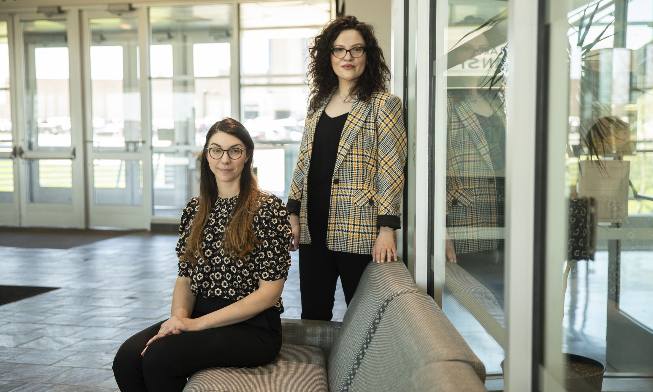 Adrienne Weston (left) and Juna Kotori (right), two 2024 Dean’s Choice Grant winners attend the SEHS School Assembly to receive their award