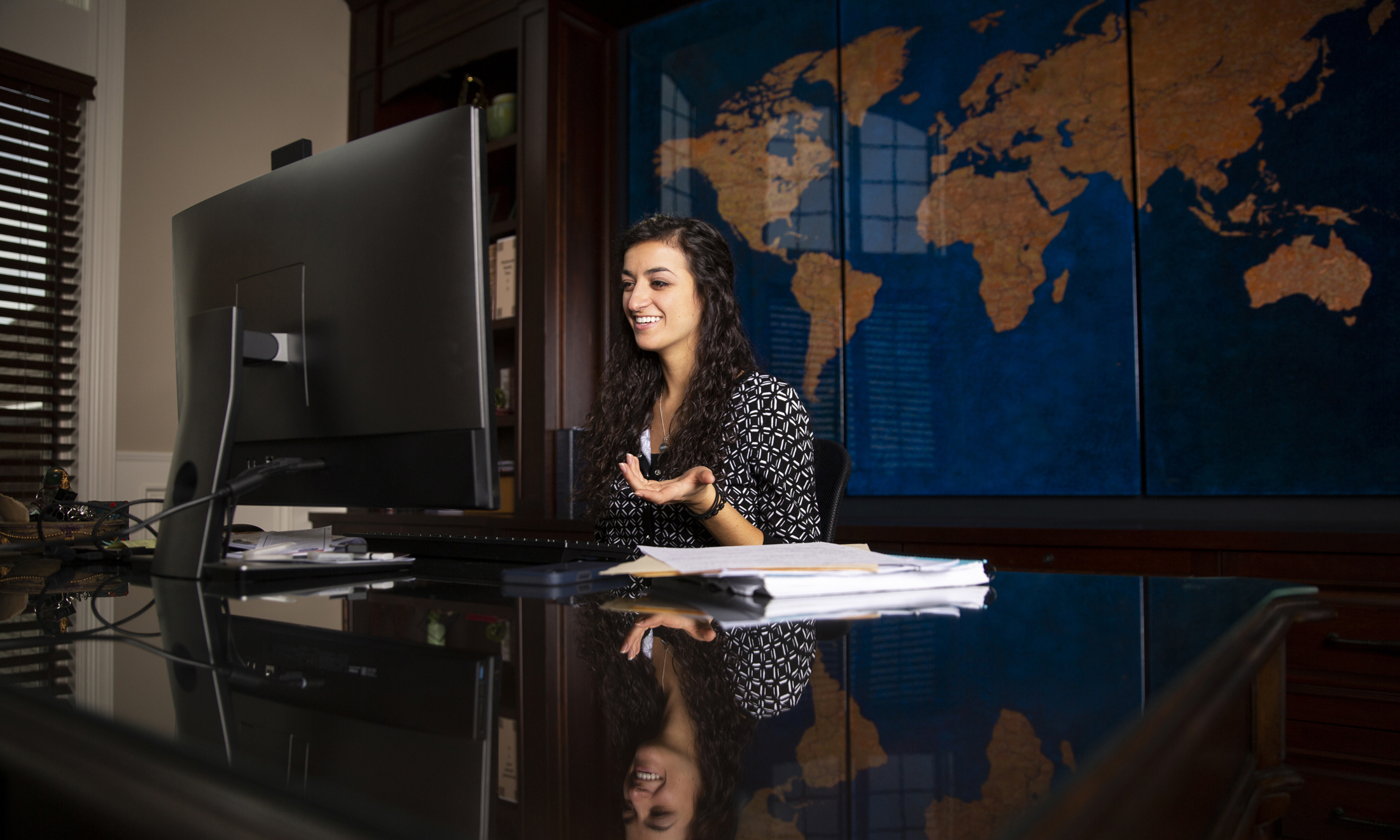 Counseling alumna Toni Pizzimenti On A Computer