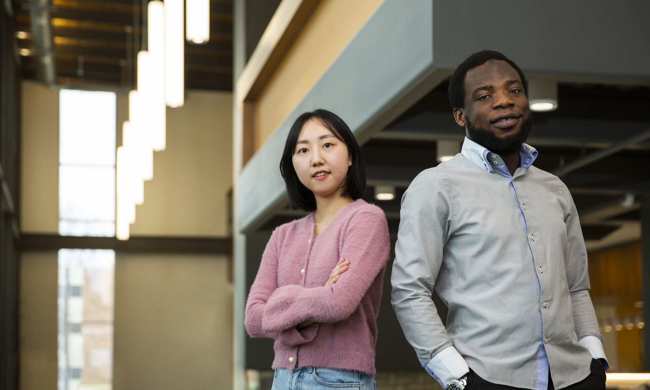 international students Boyun Kim (left) and Afeez Abdulrasak (right) who were in the early childhood education doctorate program