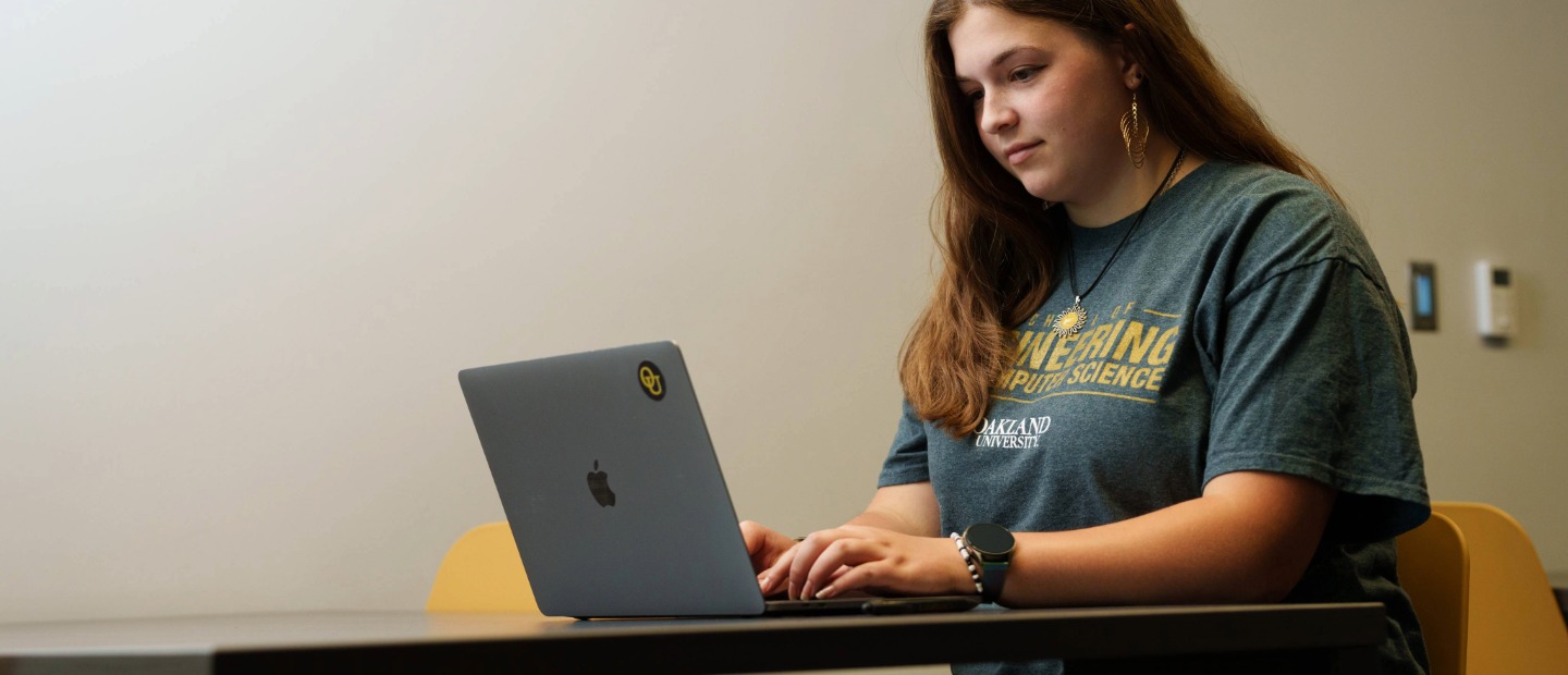 A female student applying for financial aid online