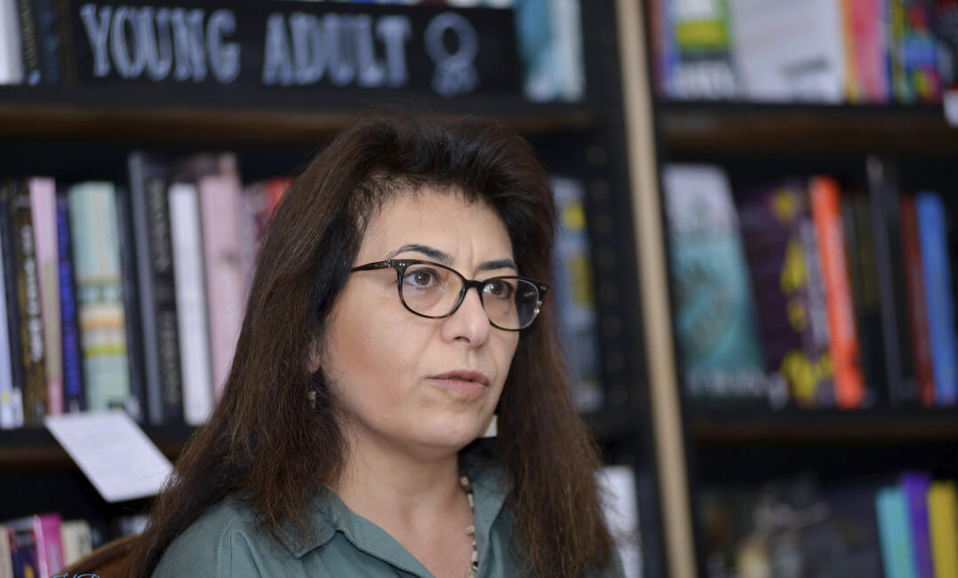 Oakland University special lecturer Dunya Mikhail poses for a photo.