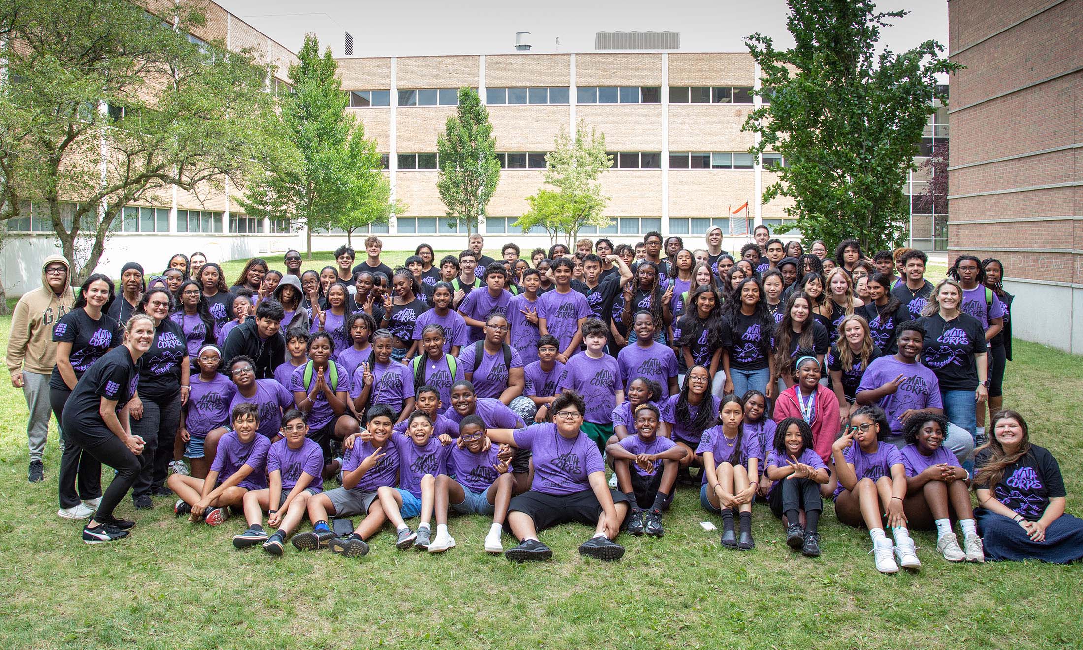 Math Corps students pose for a group photo outside.