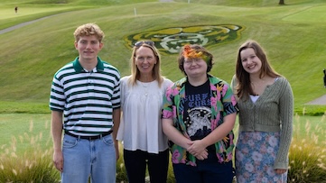 Christie Scoggin pictured with some of the current Scoggin Scholars (left to right) Nate Oberdier, Christie Scoggin, Eden Wiik and Quinn Tansell