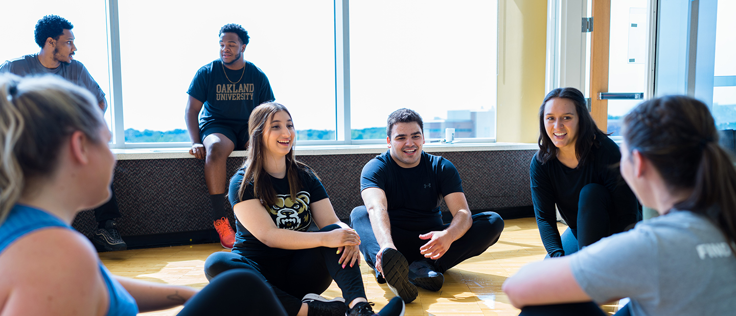 Students sitting in a circle talking