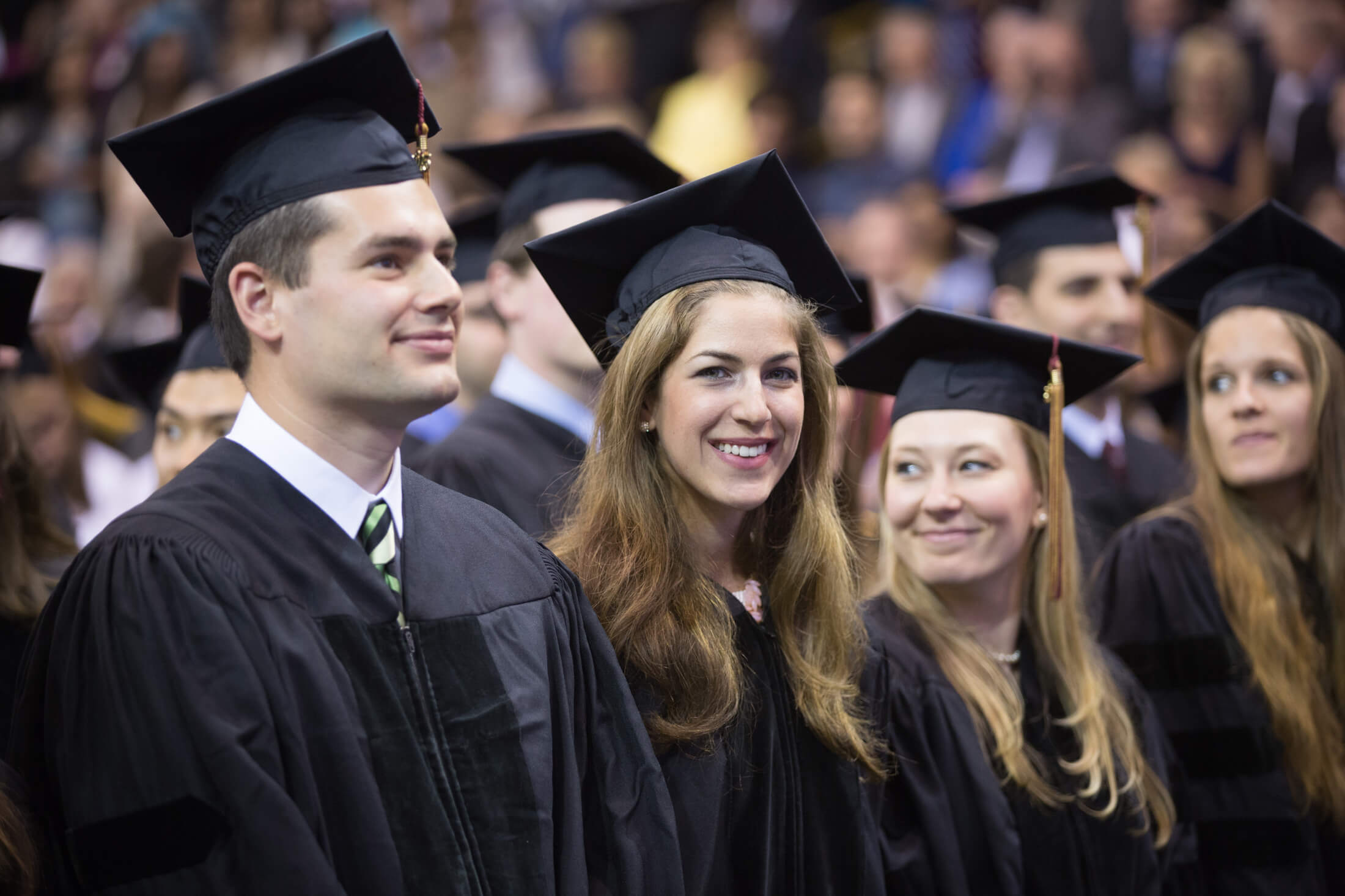 Ashley Guthrie, M.D., at commencement in cap and gown.