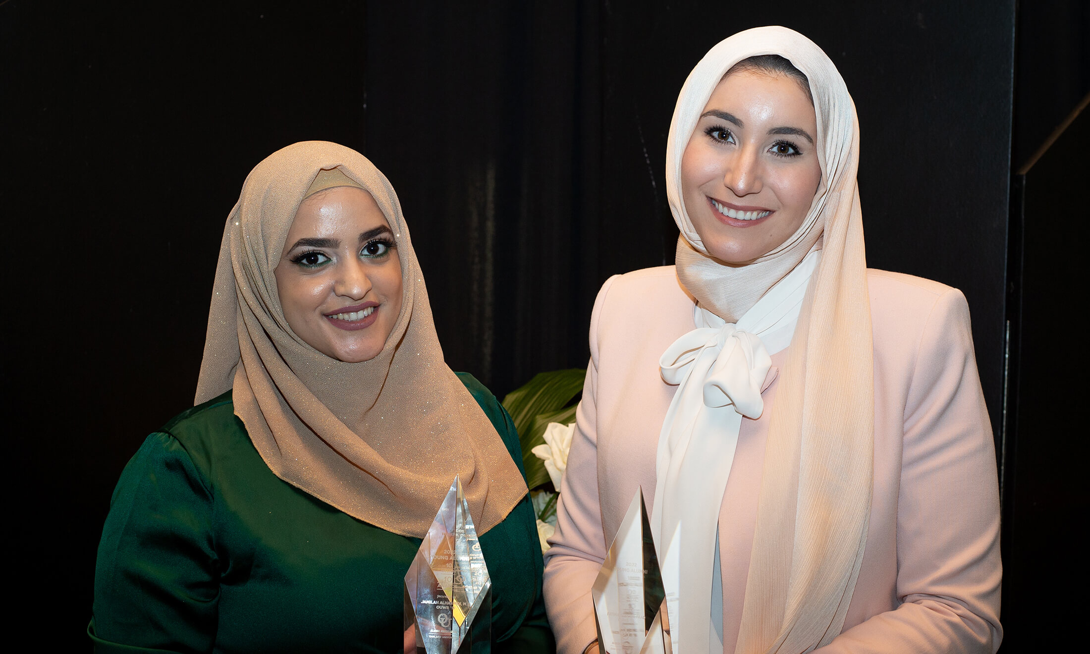 Jamilah Alhashidi and Fatima Fahs stand together smiling.