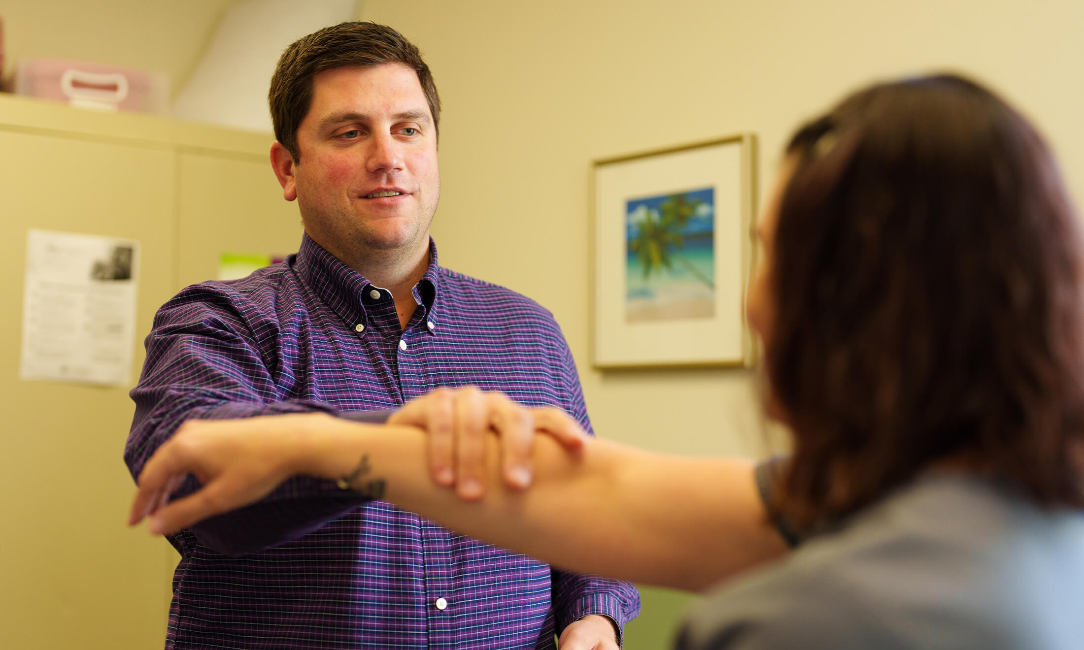 An image of Dr. Luczak with a patient