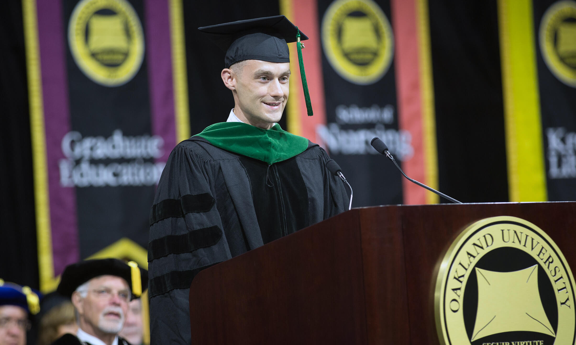 Woody Sams speaking at commencement