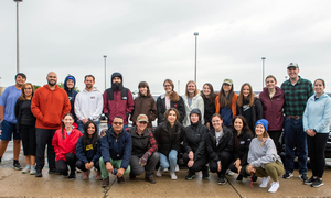 Participants who cleaned pose for a pic