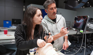A student at a clinical skills night event