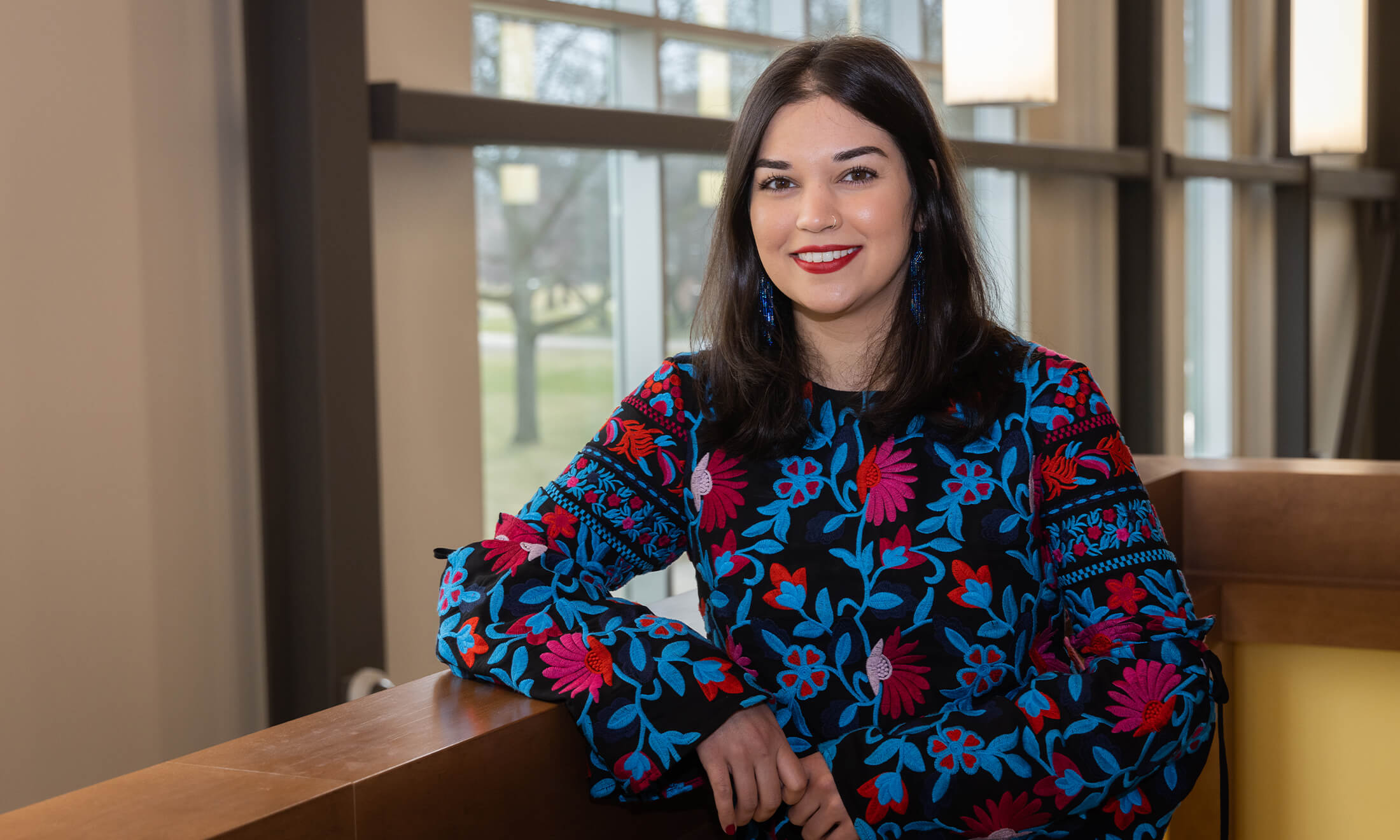 Anisah Hashmi inside a building on the O U campus.