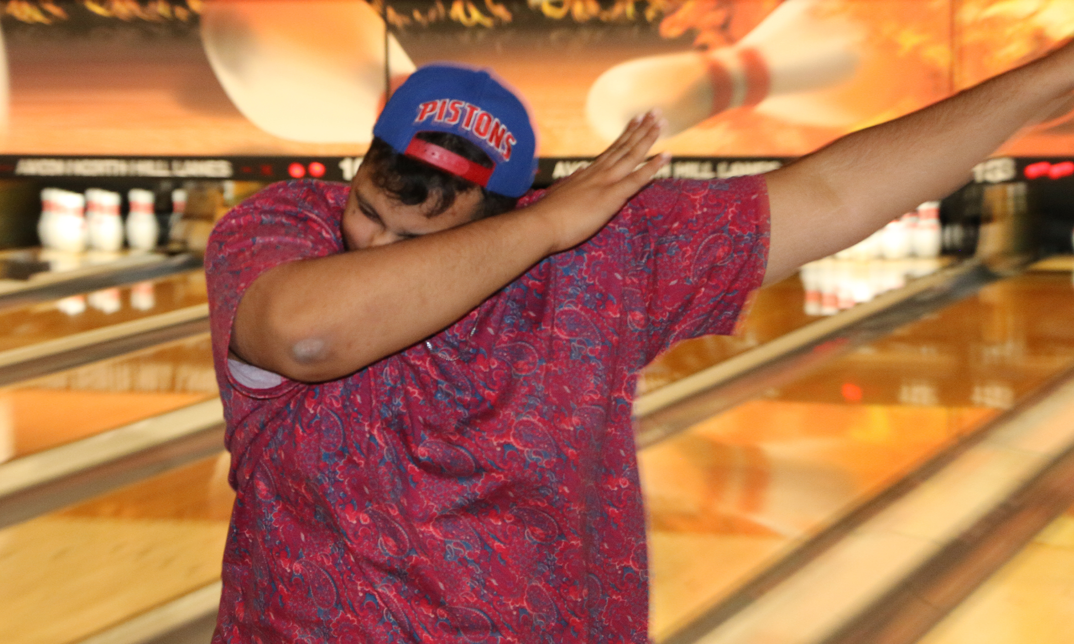 An image of OUWB students bowling and celebrating