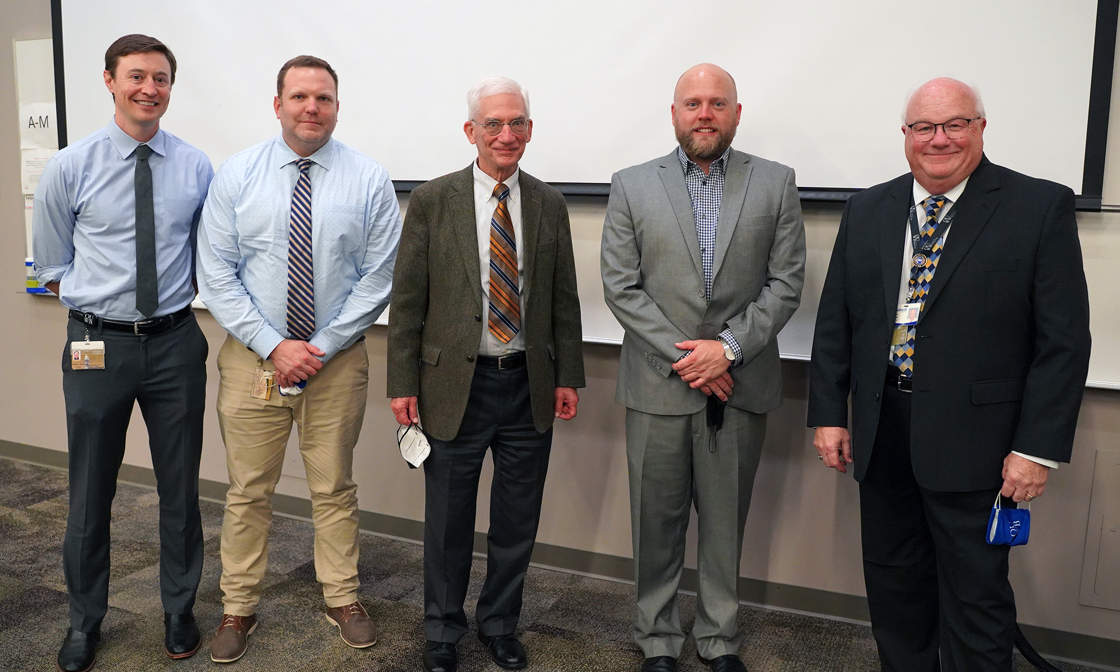 An image of OUWB's bioethics team with Dean Duane Mezwa, M.D.