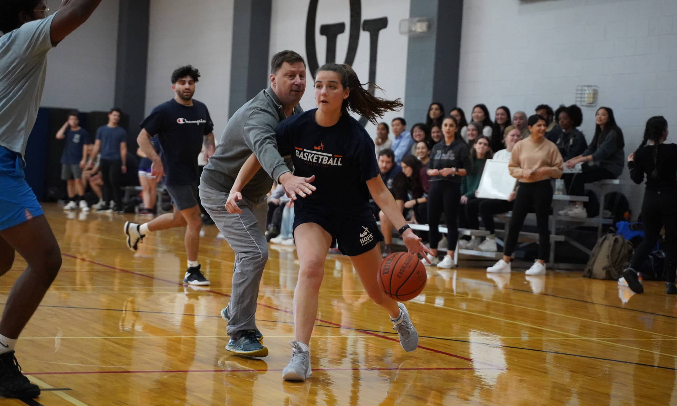 People playing basketball at the 2023 GHA basketball tournament fundraiser