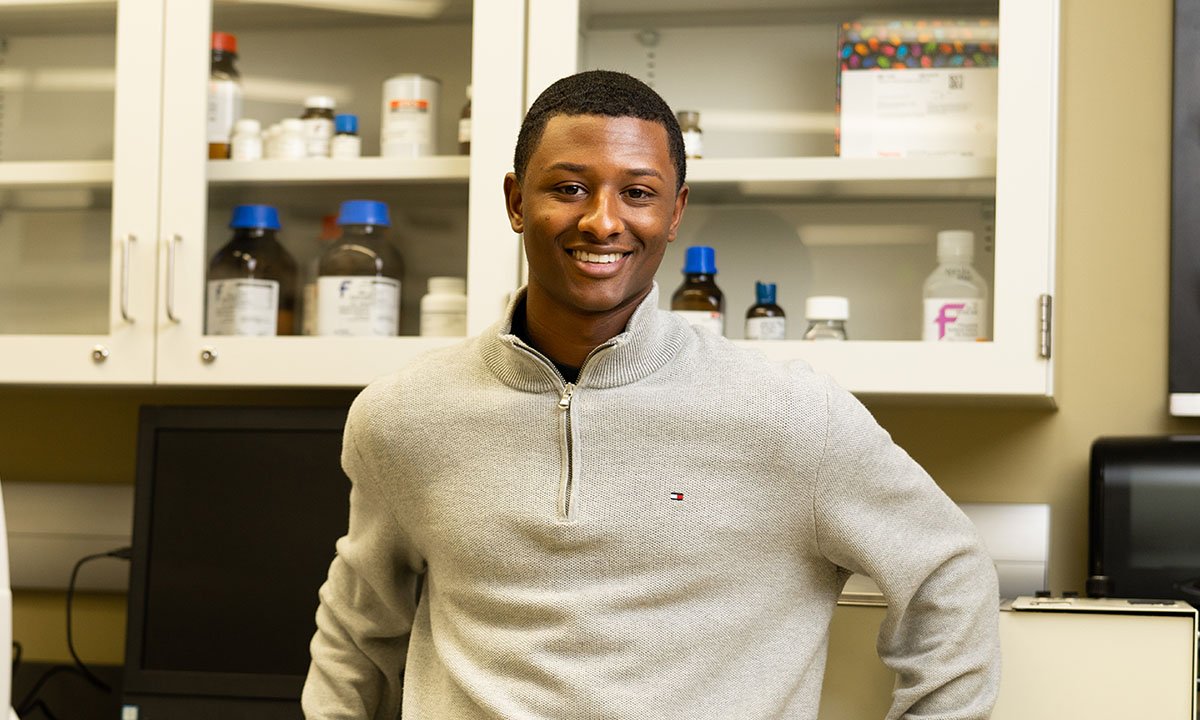 Student standing in lab