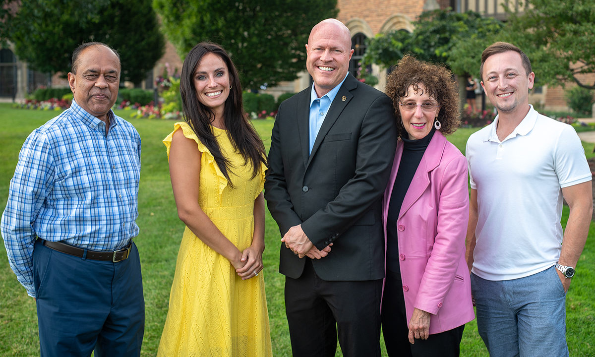 Five people posing