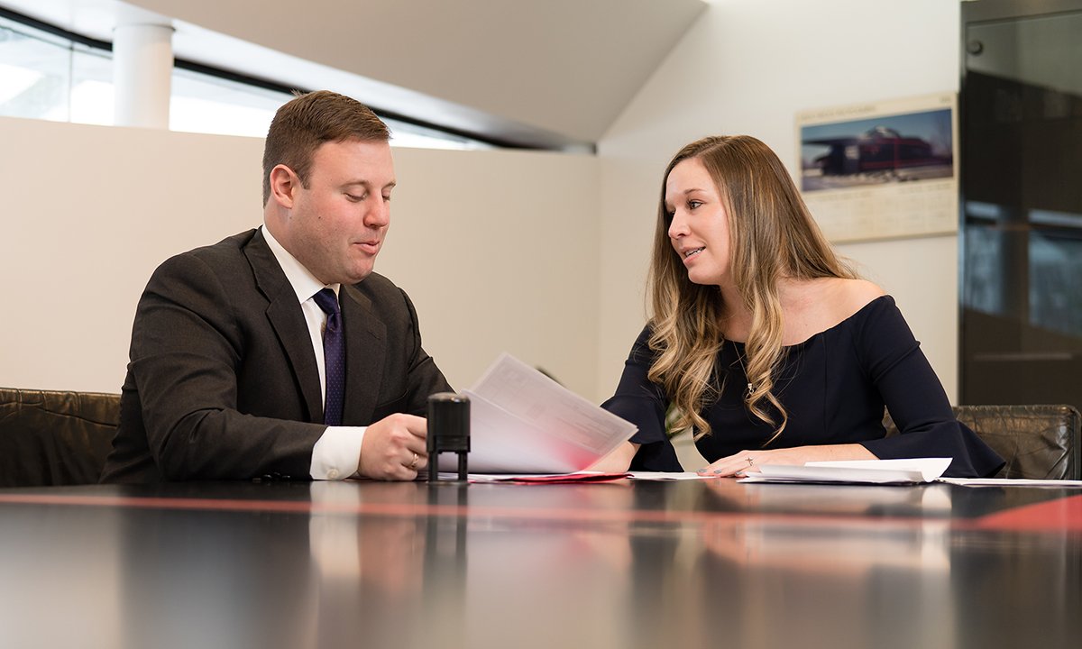 A man and a woman sitting at a table.