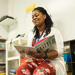 A woman reading a book.