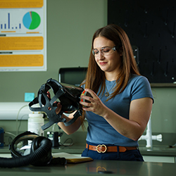 A woman working with equipment