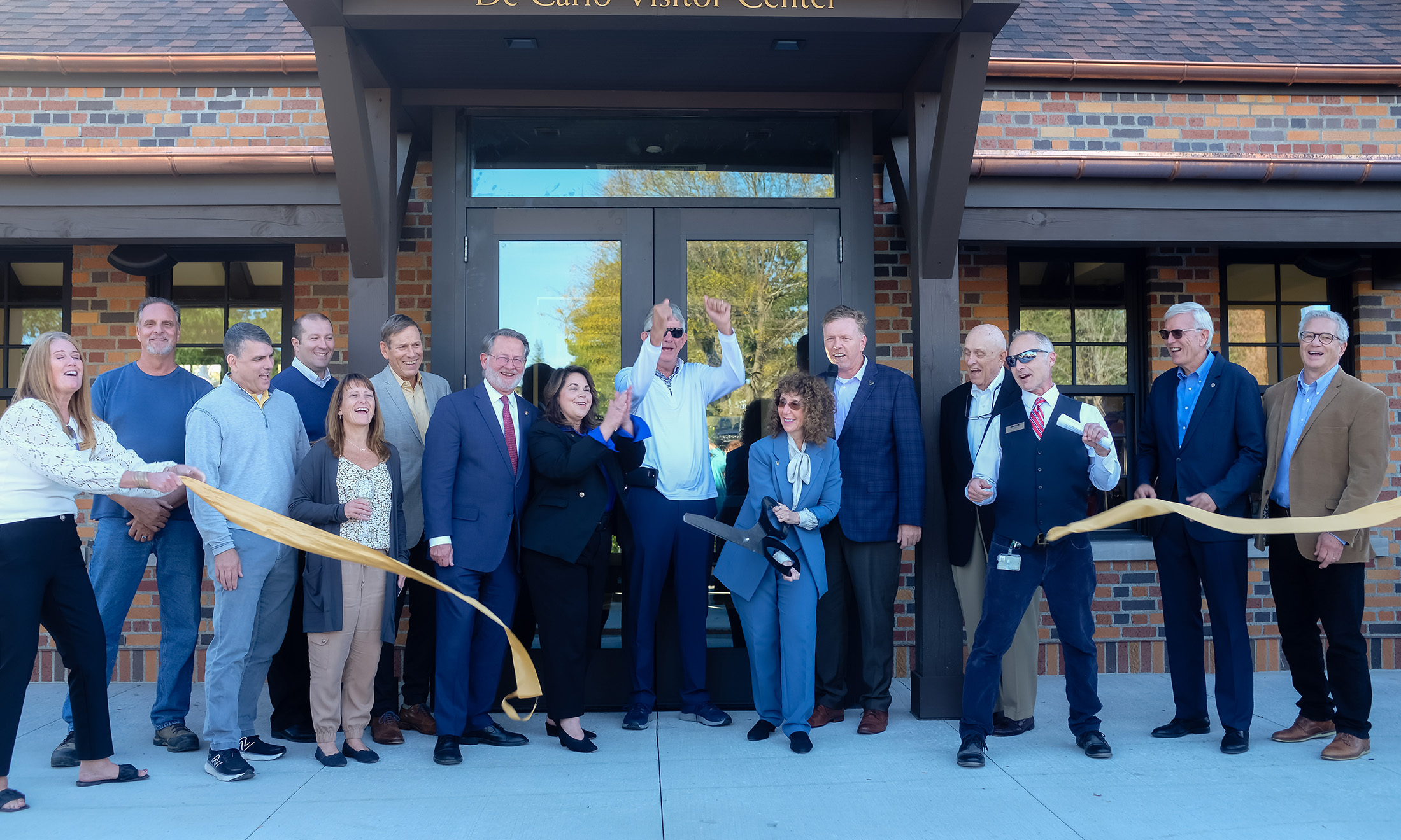 de carlo ribbon cutting image