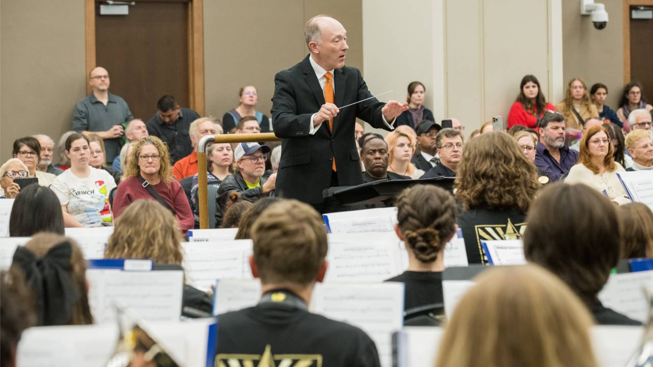 Kevin M. Geraldi conducts at OU's High School Honor Band event