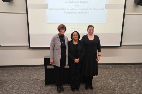 Students making doctoral dissertation defenses
