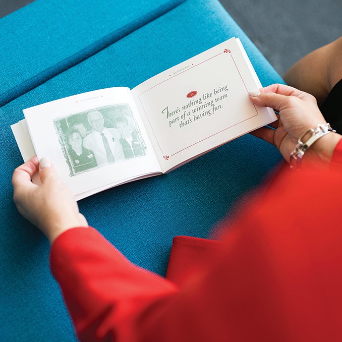 An opened book with the reads, 