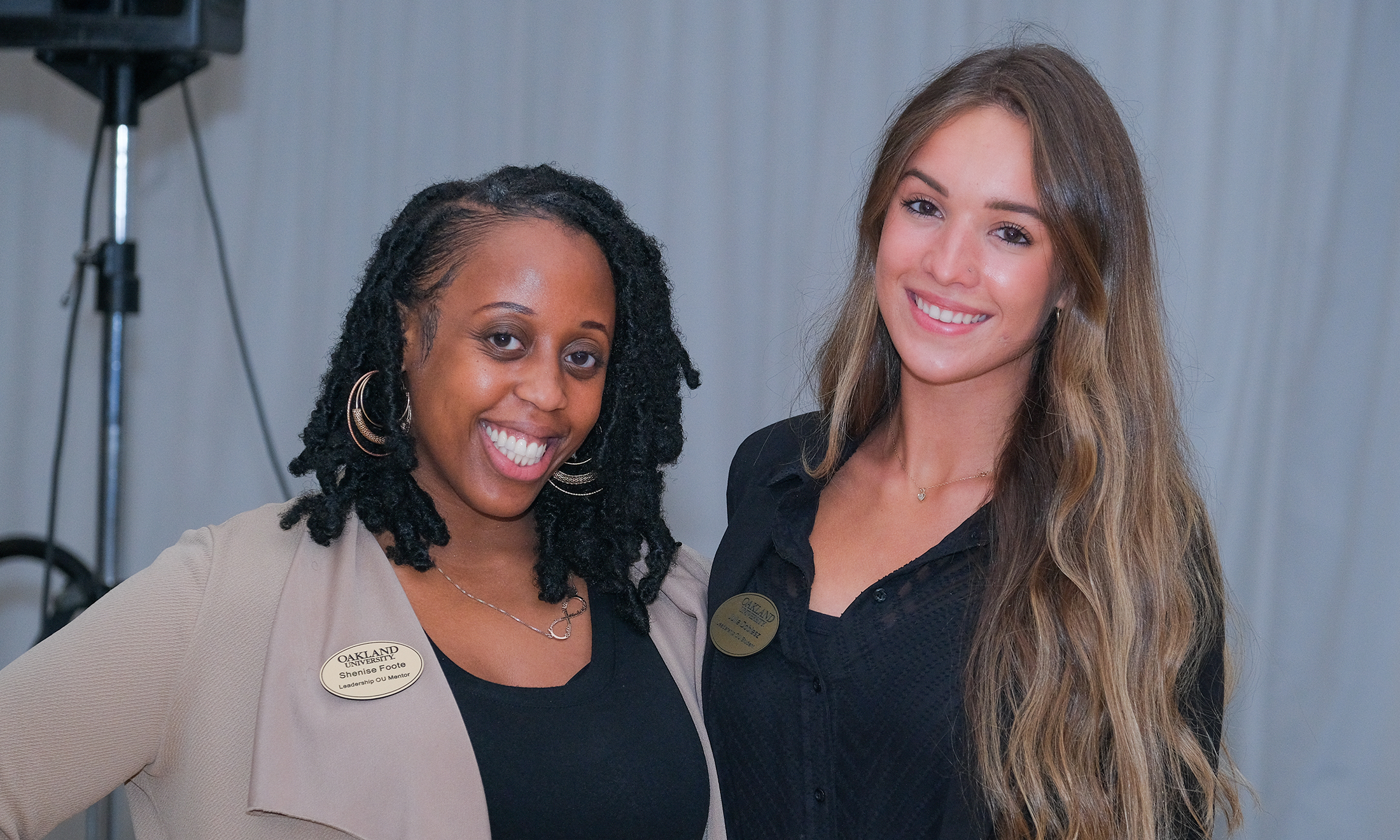 Two people smiling for a photo